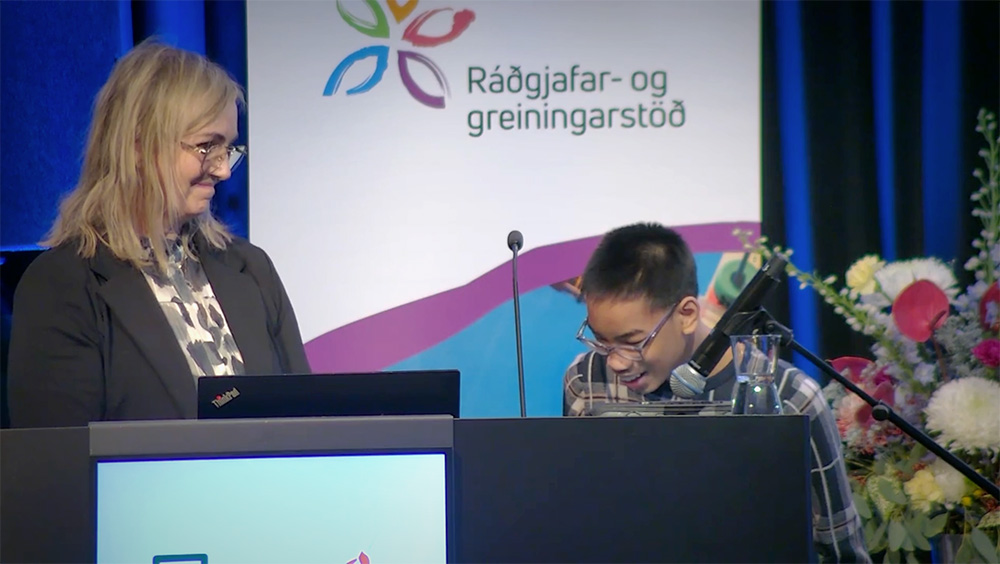 Hanna Rún Eiríksdóttir og Dan Kittikun upp á sviði á Hilton